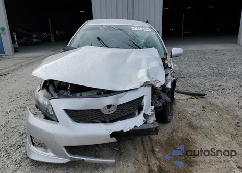 2009 Toyota Corolla Base из США, поврежденный, VIN 1NXBU40E39Z008014